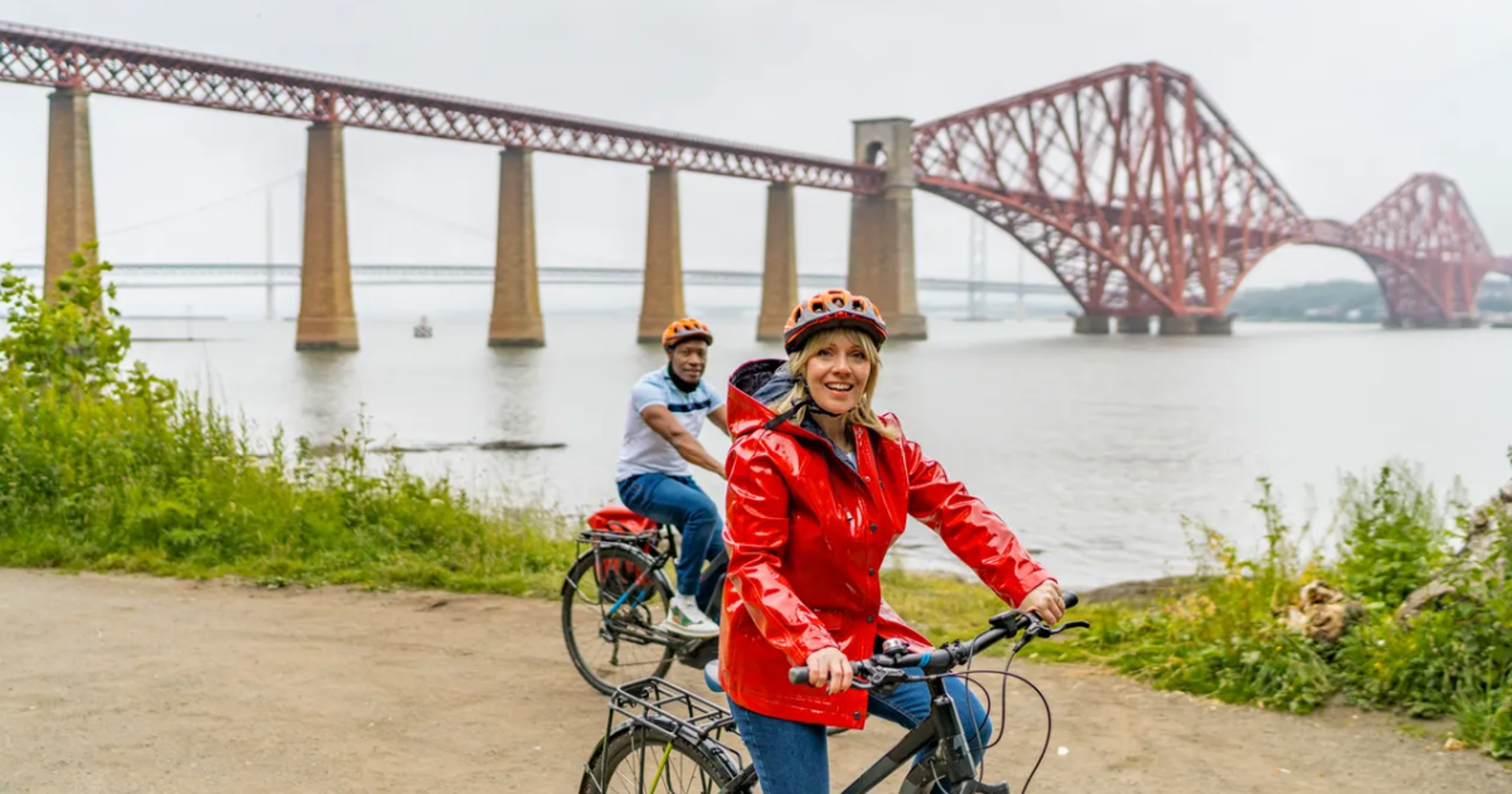 Background image - Cycling by Forth Bridge (Visit Scotland)